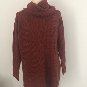 Rust colored sweater with open sides
